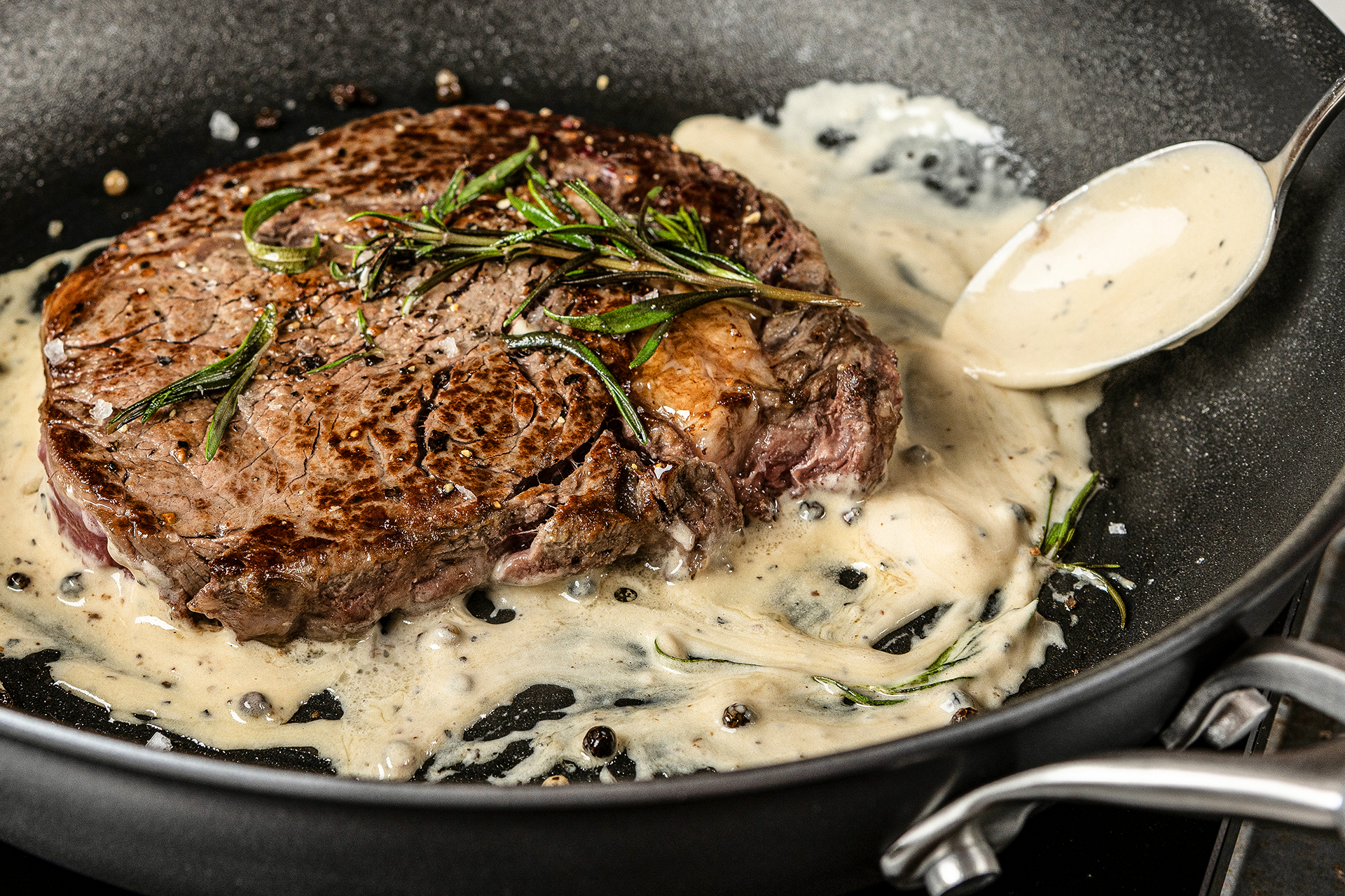 food photography of steak in a pan by Circulon UK on location with Advertising Agency Refinery Manchester